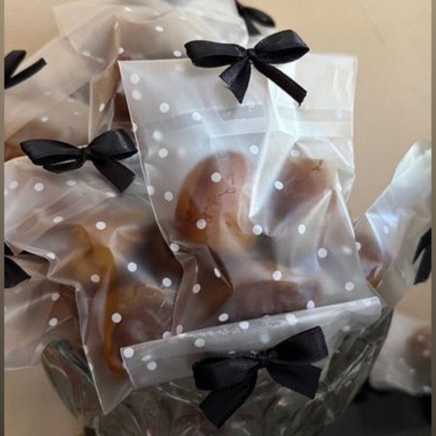 Sac vide en plastique conviviale transparent orné d’un nœud noir