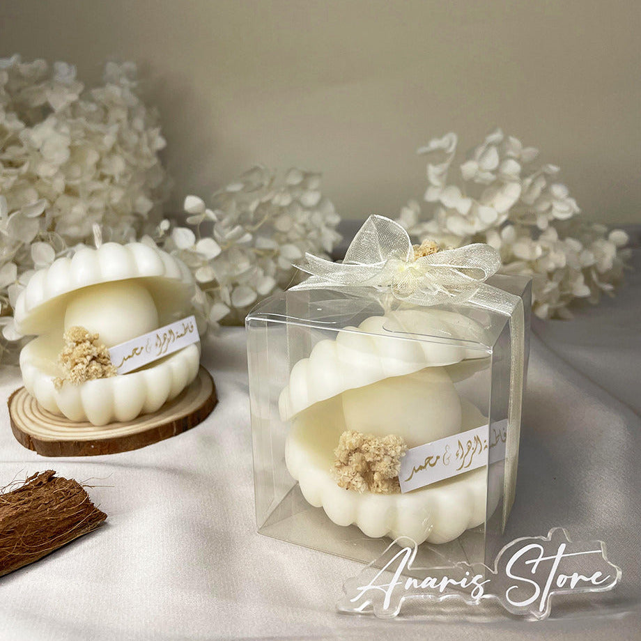 Bougie Parfumée,en forme de coquillage dans une boîte cadeau transparente