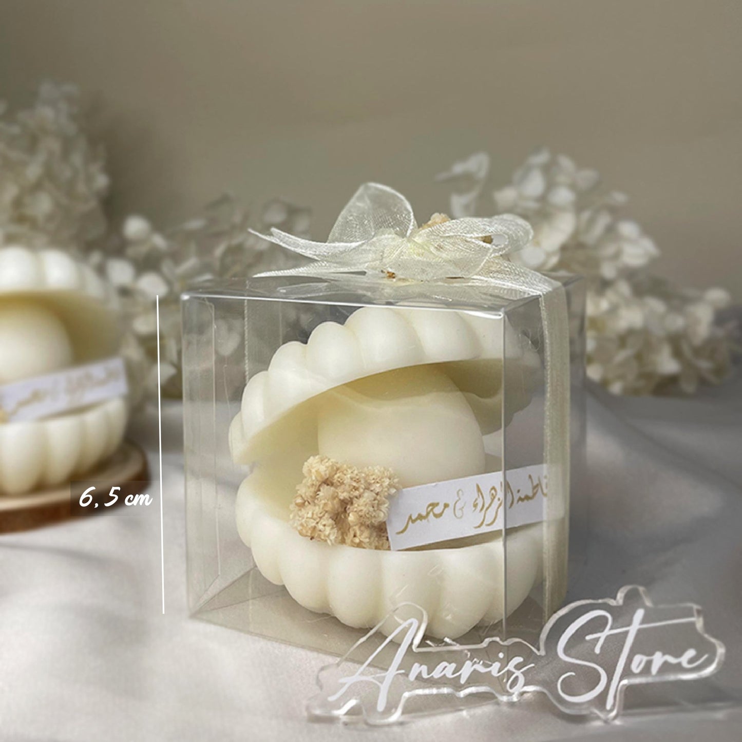 Bougie Parfumée,en forme de coquillage dans une boîte cadeau transparente