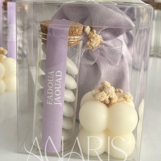 Coffret Cadeau compose de :bougie forme bubbles, fiole dragées , sachet remplie au choix